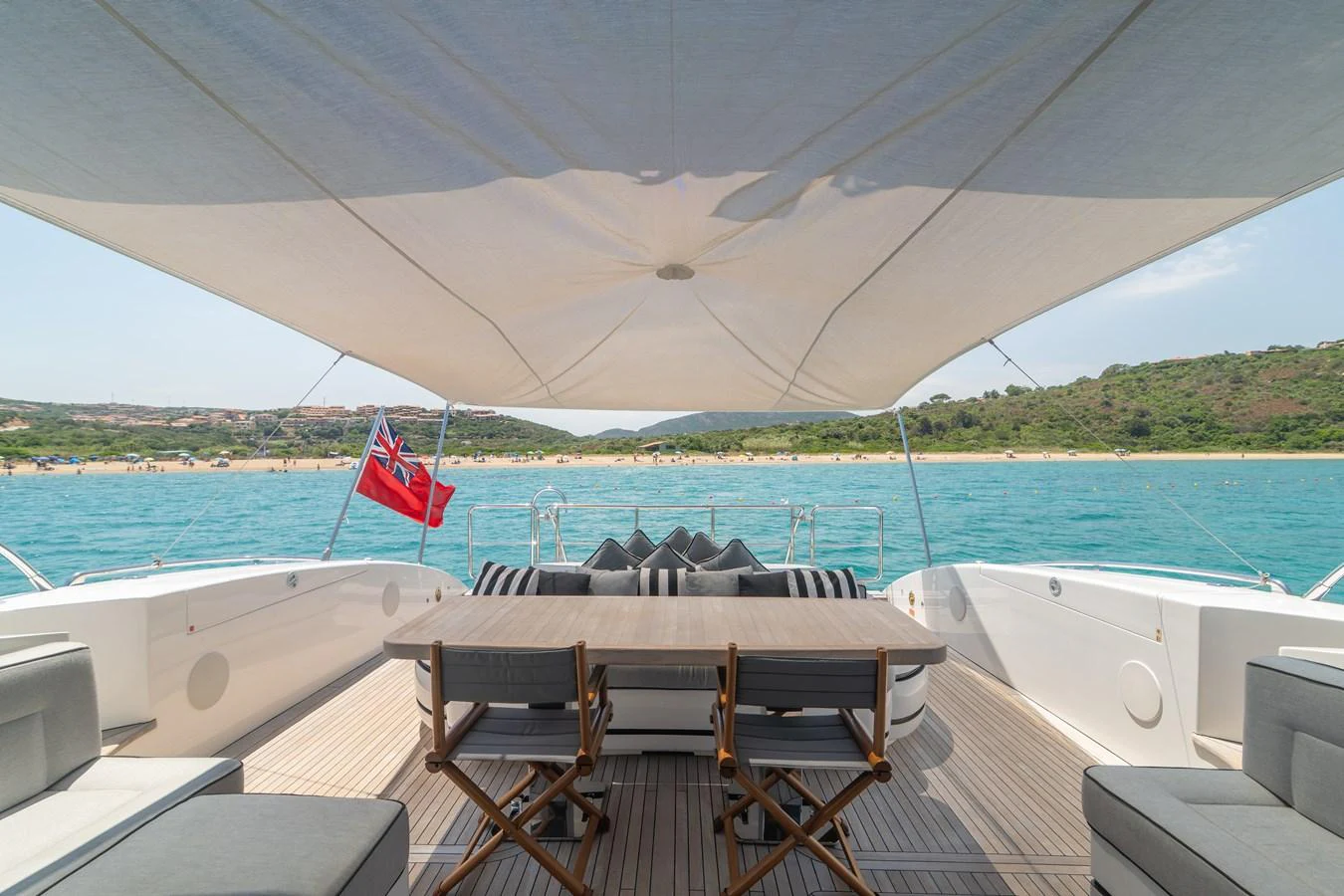 a table and chairs on a boat aboard KAWAI Yacht for Sale