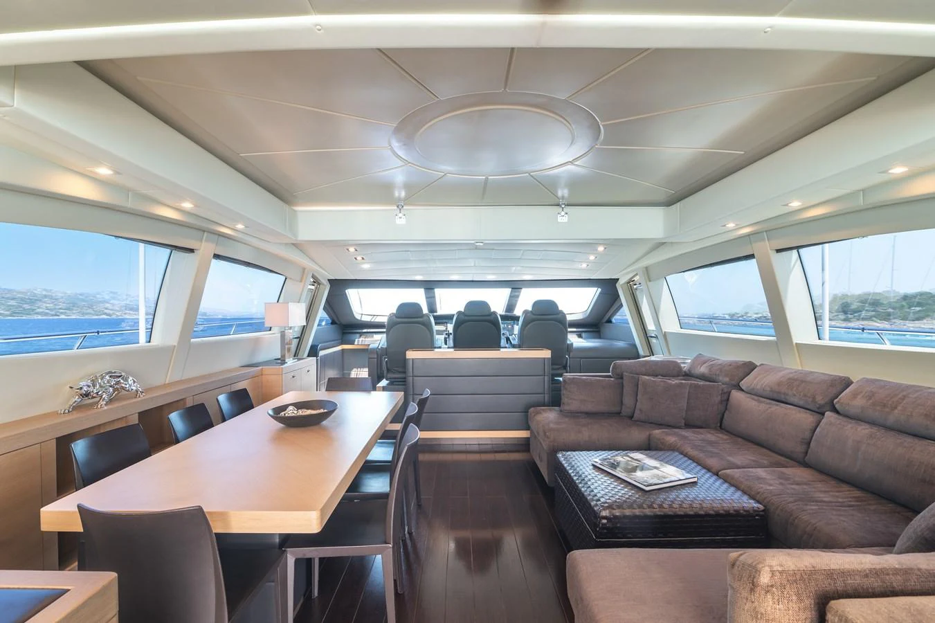 a room with a couch and a table aboard KAWAI Yacht for Sale