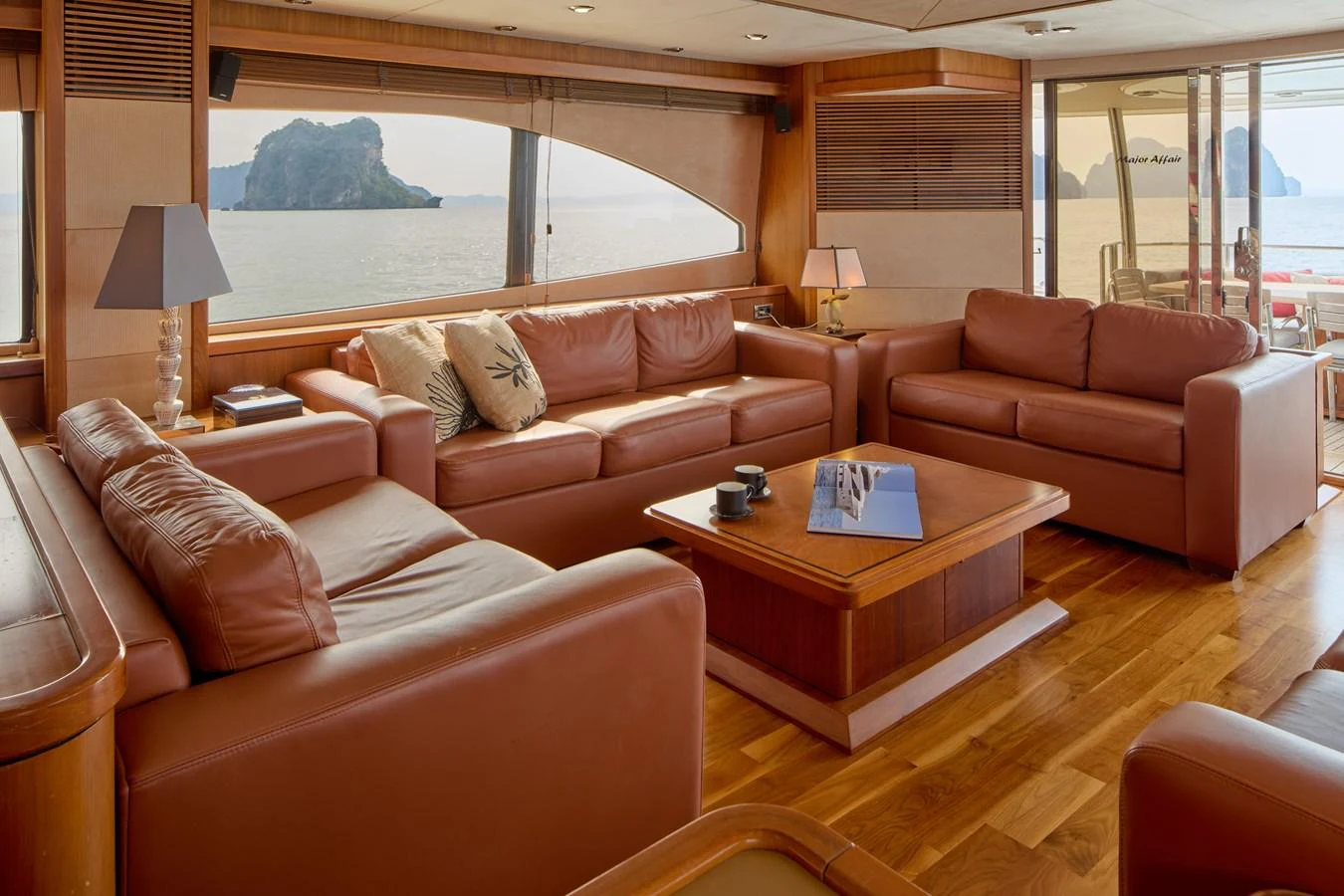 a living room with a large window aboard MAJOR AFFAIR Yacht for Sale