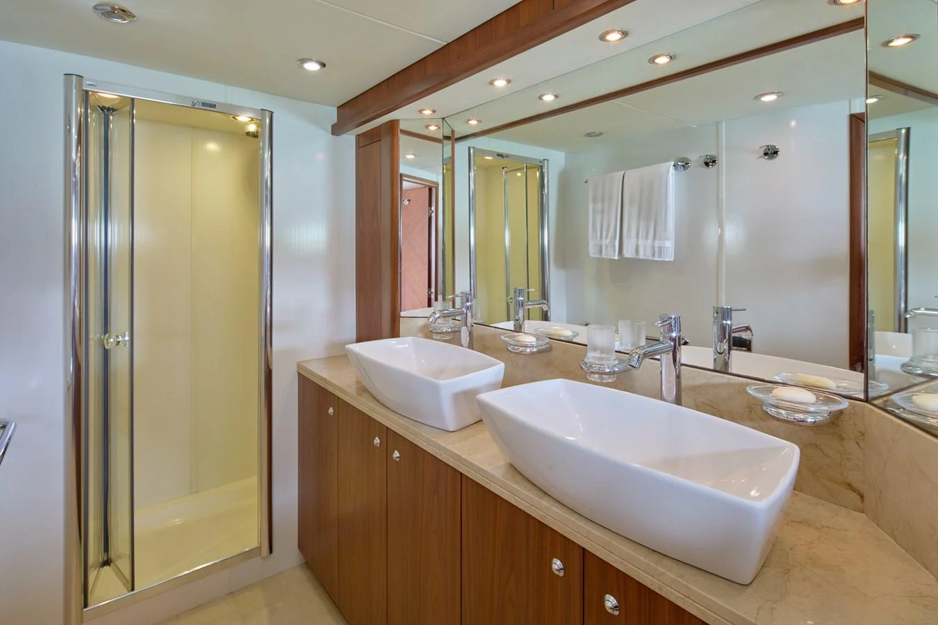 a bathroom with a large mirror aboard MAJOR AFFAIR Yacht for Sale