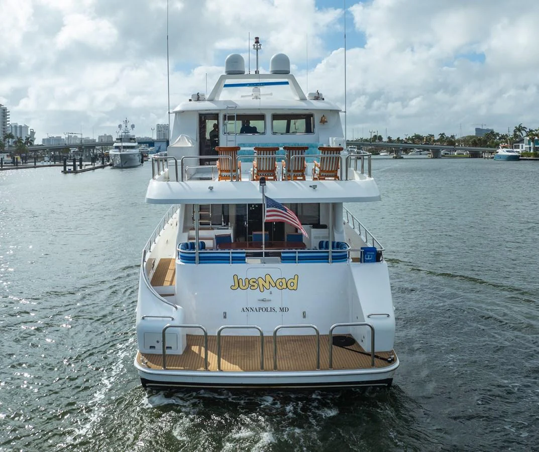a large white boat in the water aboard JUSMAD Yacht for Sale