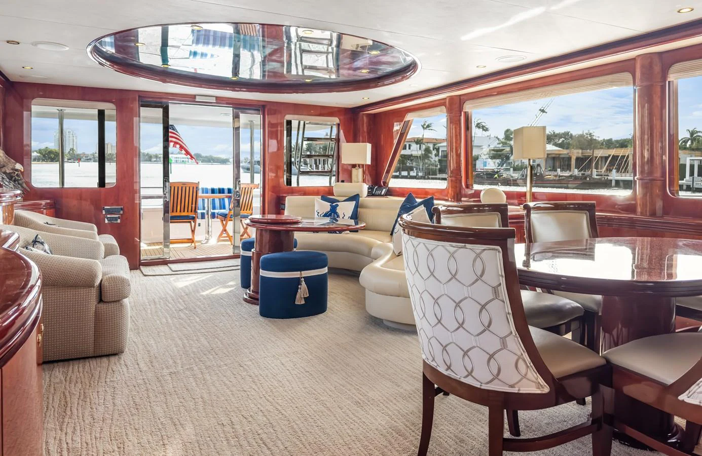 a living room with a large window aboard JUSMAD Yacht for Sale