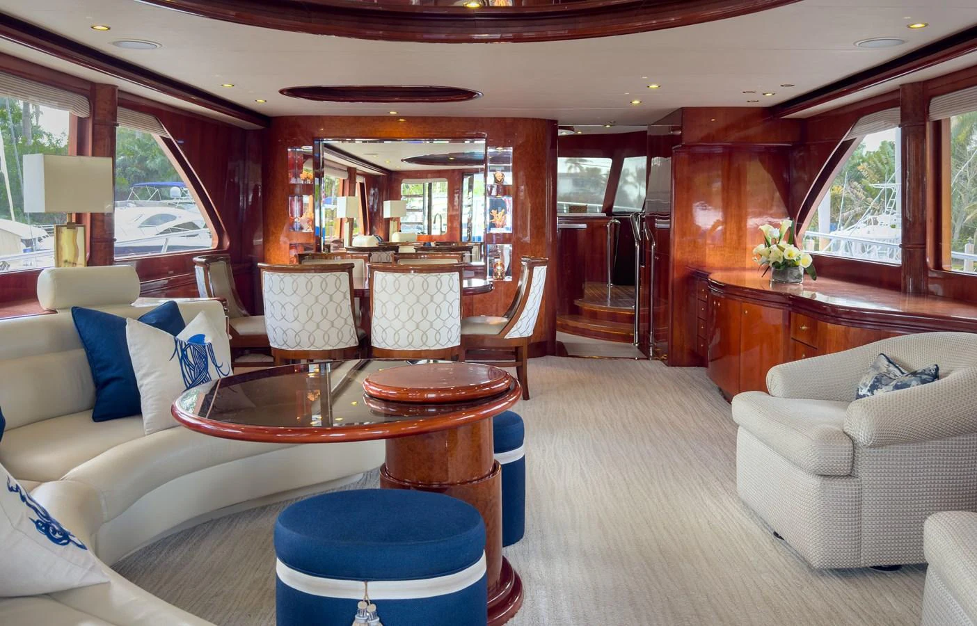 a living room with a table and chairs aboard JUSMAD Yacht for Sale