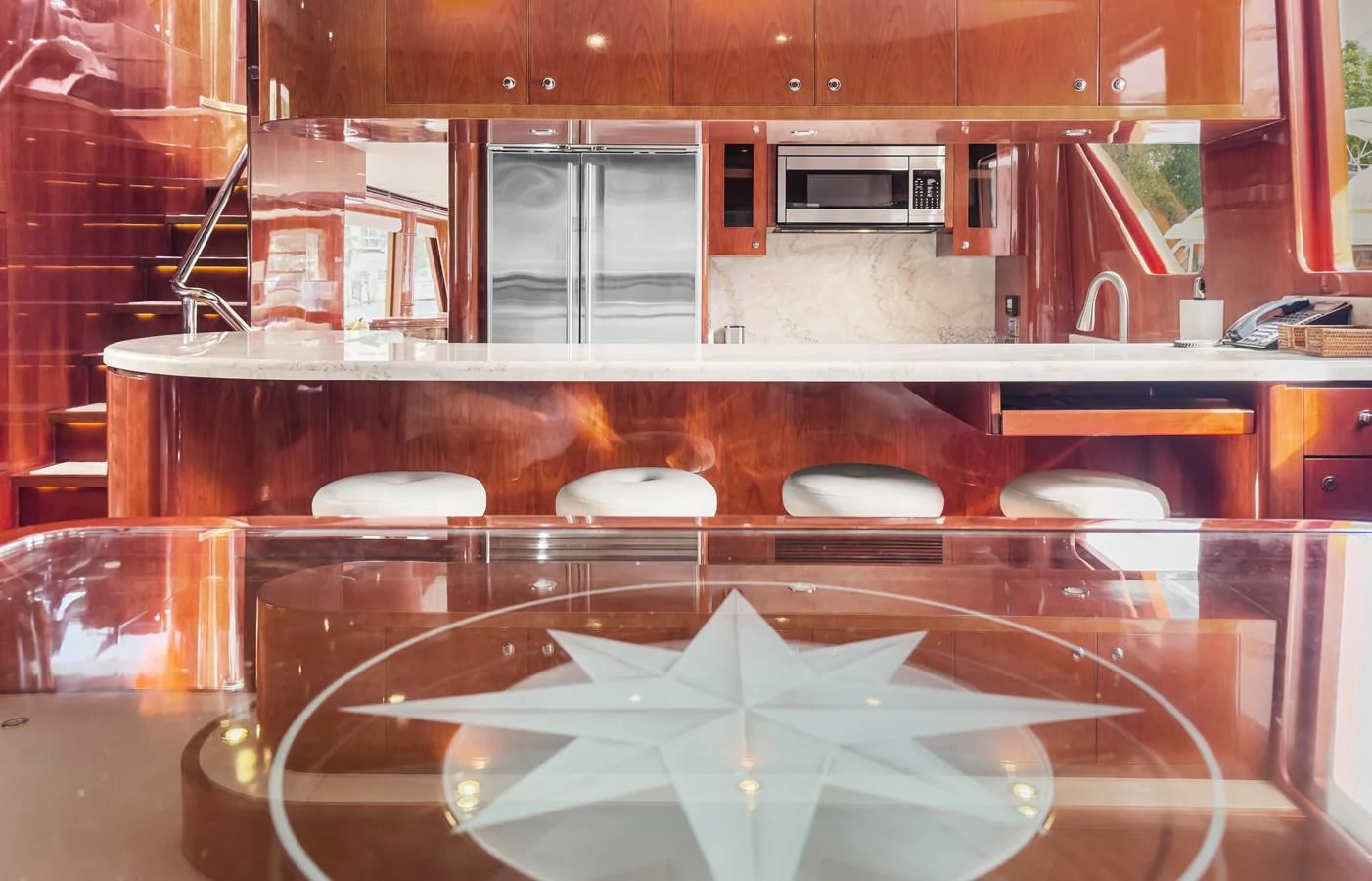 a kitchen with a large island aboard JUSMAD Yacht for Sale