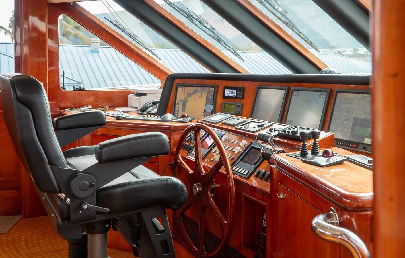 a leather chair in a train aboard JUSMAD Yacht for Sale
