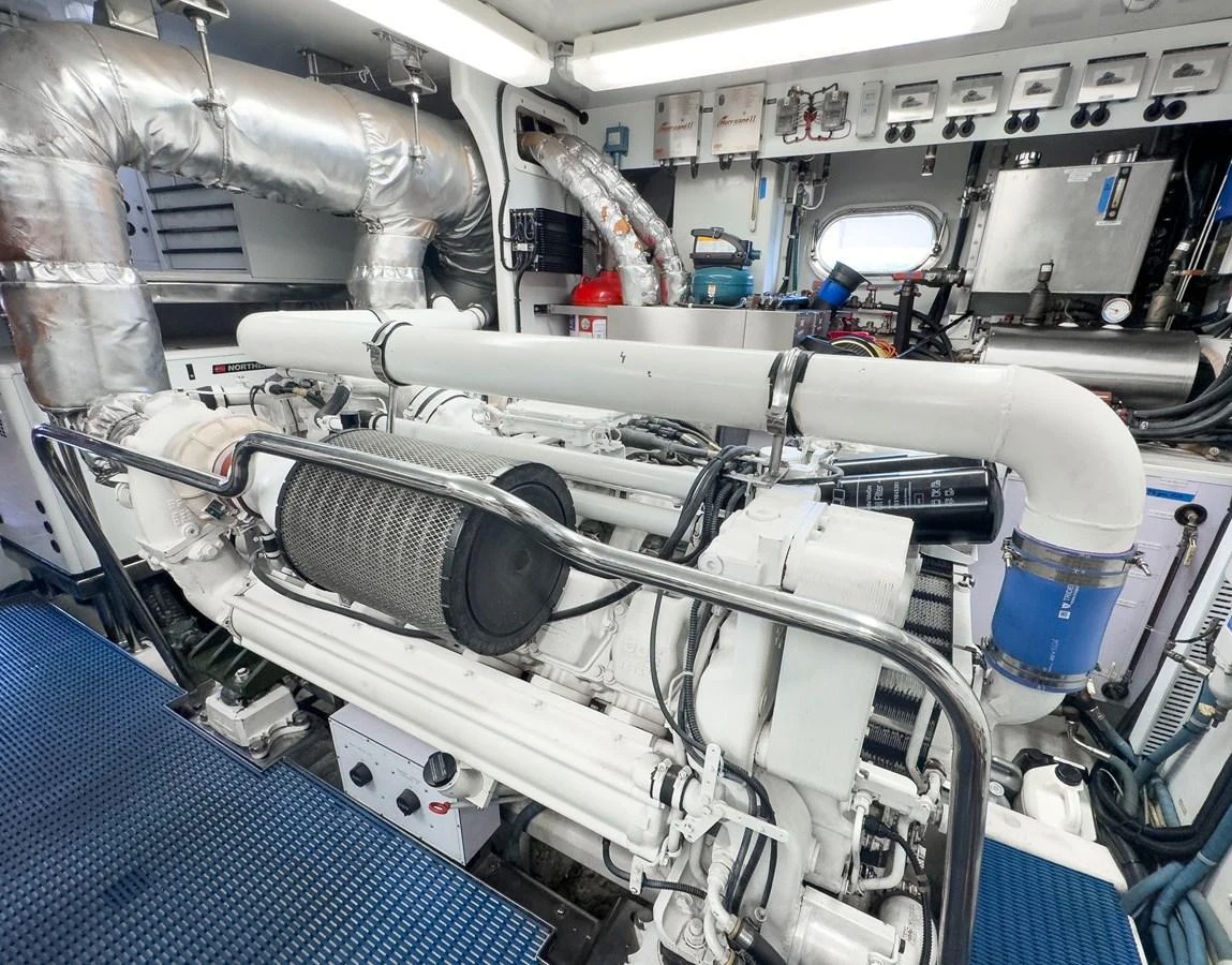 a room with several pipes aboard JUSMAD Yacht for Sale