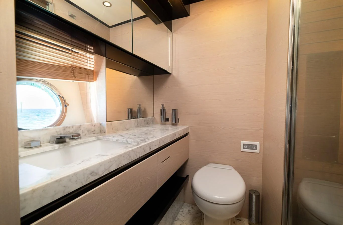 a bathroom with a sink and a toilet aboard SABI Yacht for Sale