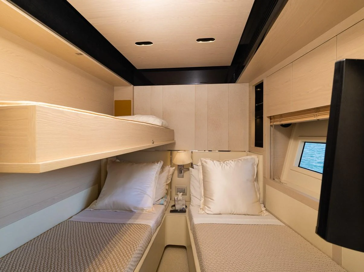 a room with two beds aboard SABI Yacht for Sale