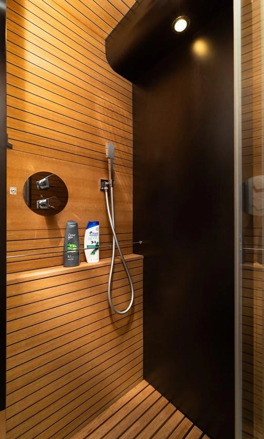 a door with a handle and a tube on the door aboard SABI Yacht for Sale