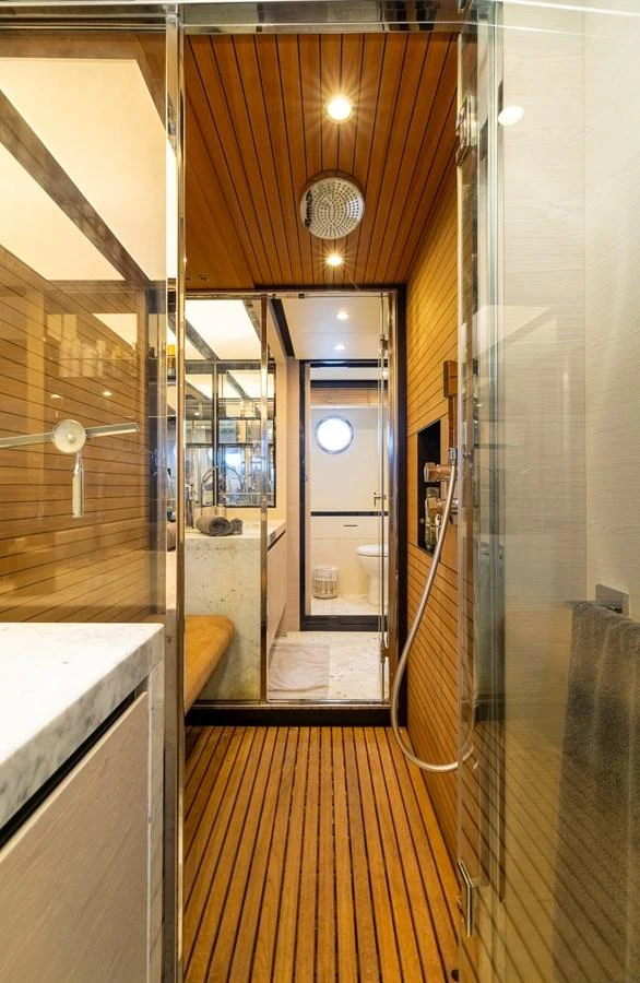 a room with a glass door aboard SABI Yacht for Sale