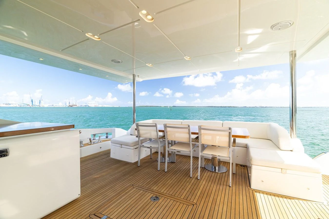The aft deck offers a spacious and inviting area for alfresco dining with stunning ocean views. aboard SABI Yacht for Sale