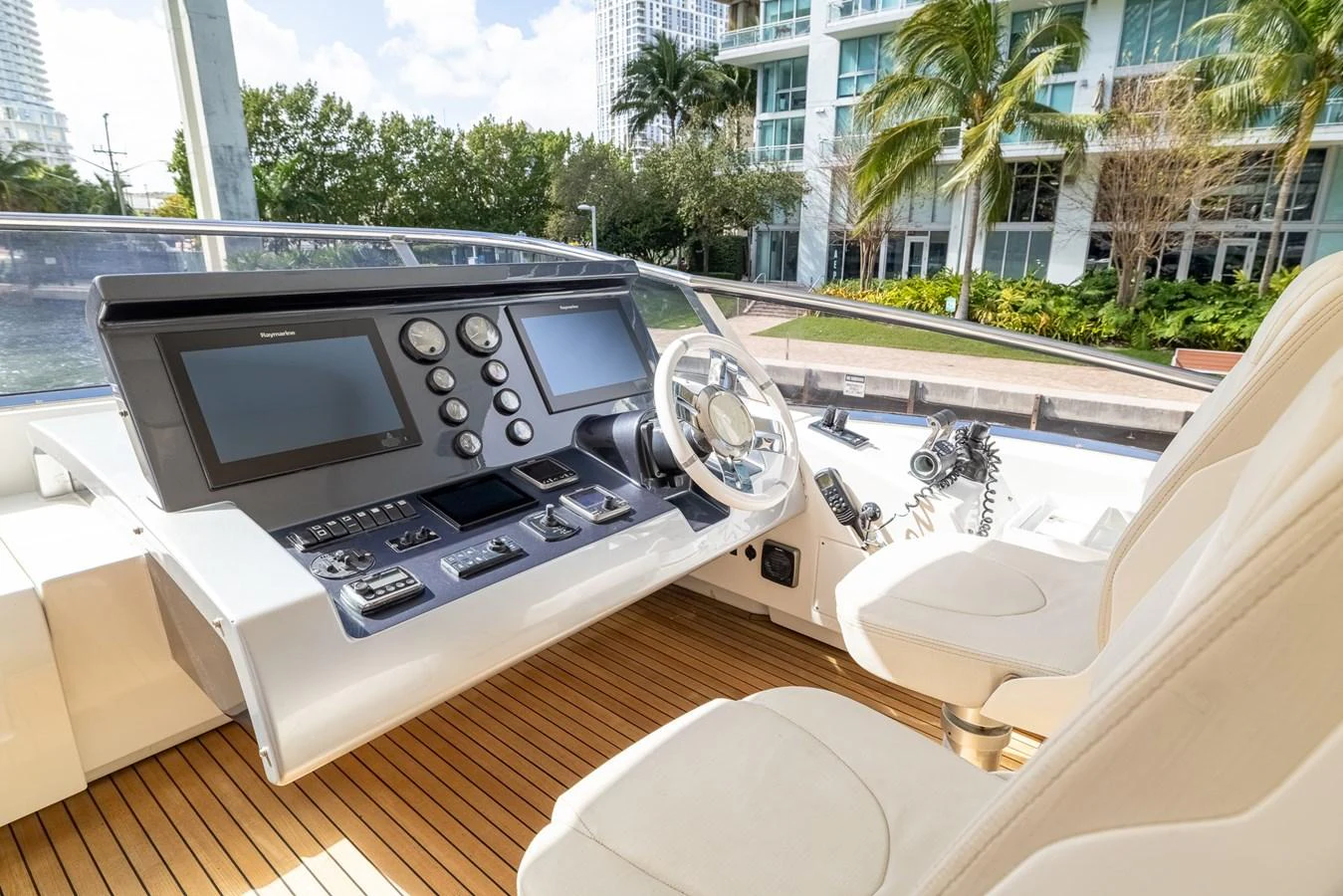 a car with a screen on the dashboard aboard SABI Yacht for Sale