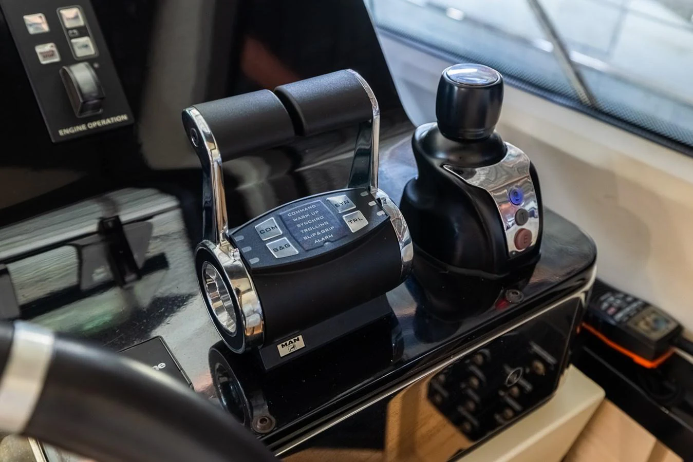 a black car with a black gas pump and a black seat aboard SABI Yacht for Sale