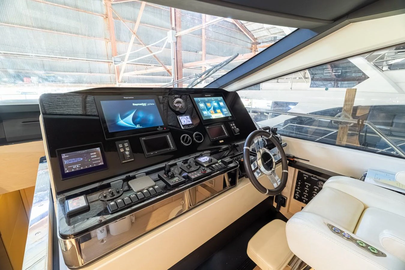 inside of a car aboard SABI Yacht for Sale