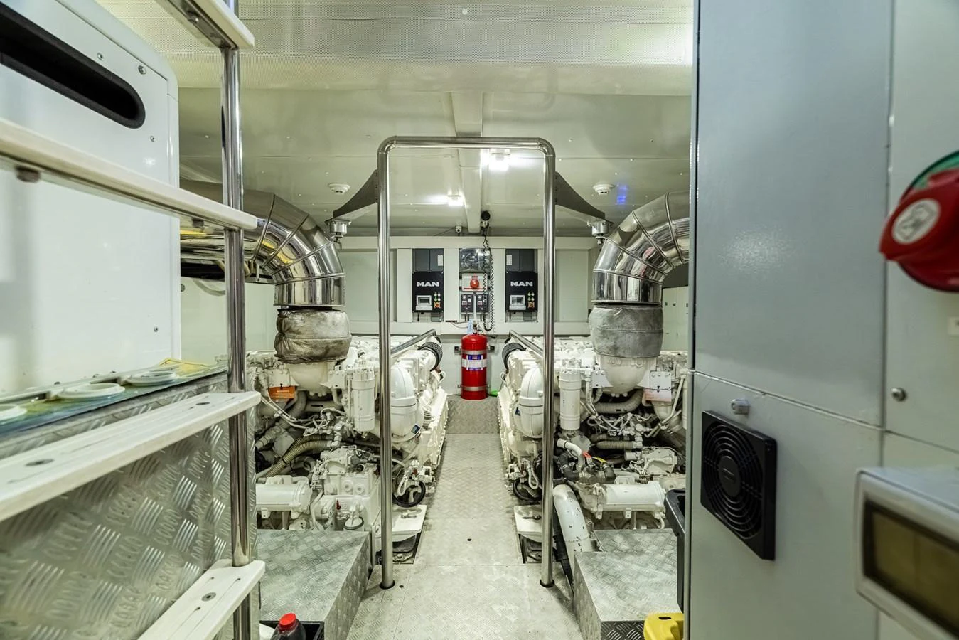 The image showcases the well-maintained engine room of the yacht, highlighting its powerful machinery and organized layout. aboard SABI Yacht for Sale