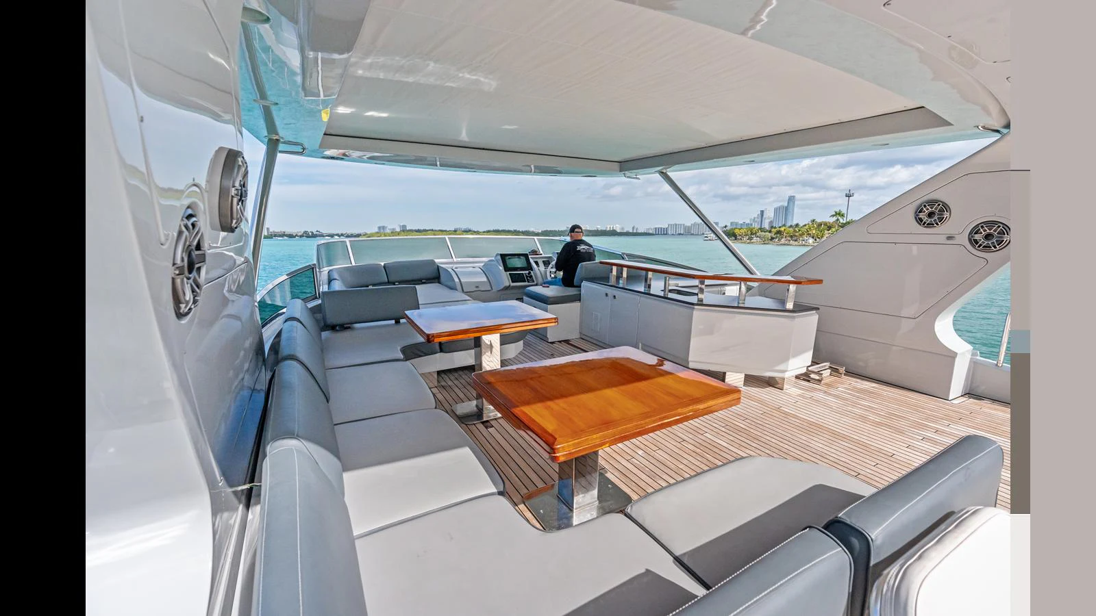 a boat with a table and chairs aboard KNOT WOKE Yacht for Sale