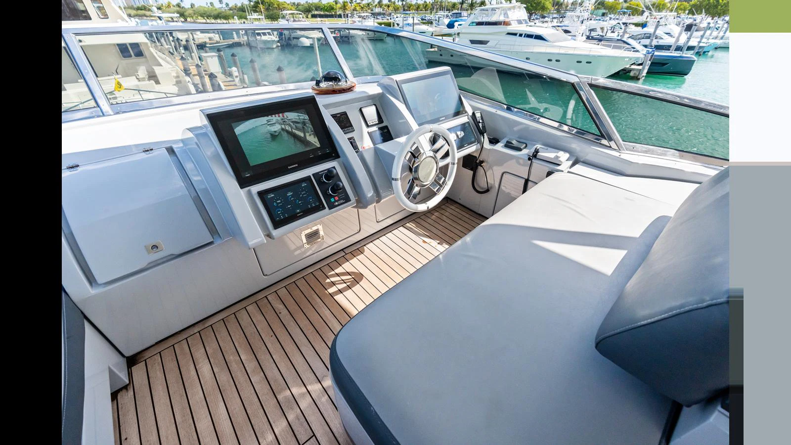 a car on a deck aboard KNOT WOKE Yacht for Sale