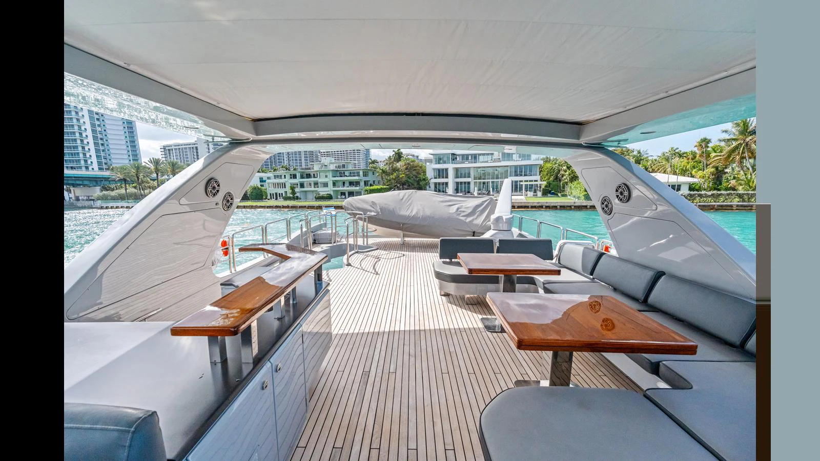a room with many beds and a large window aboard KNOT WOKE Yacht for Sale