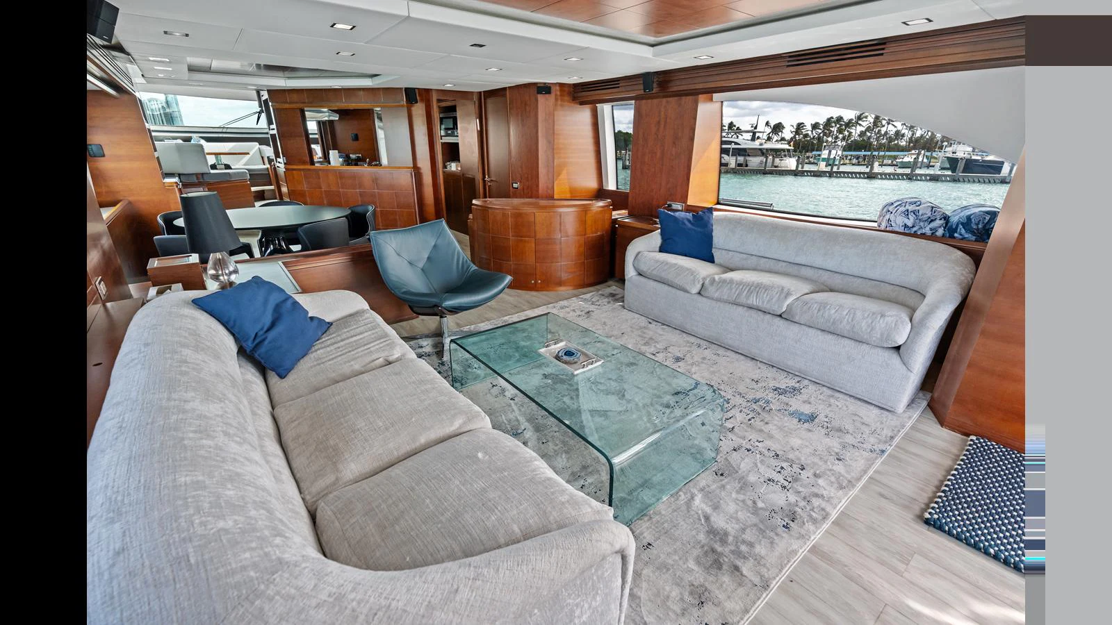 a room with a couch and a table aboard KNOT WOKE Yacht for Sale
