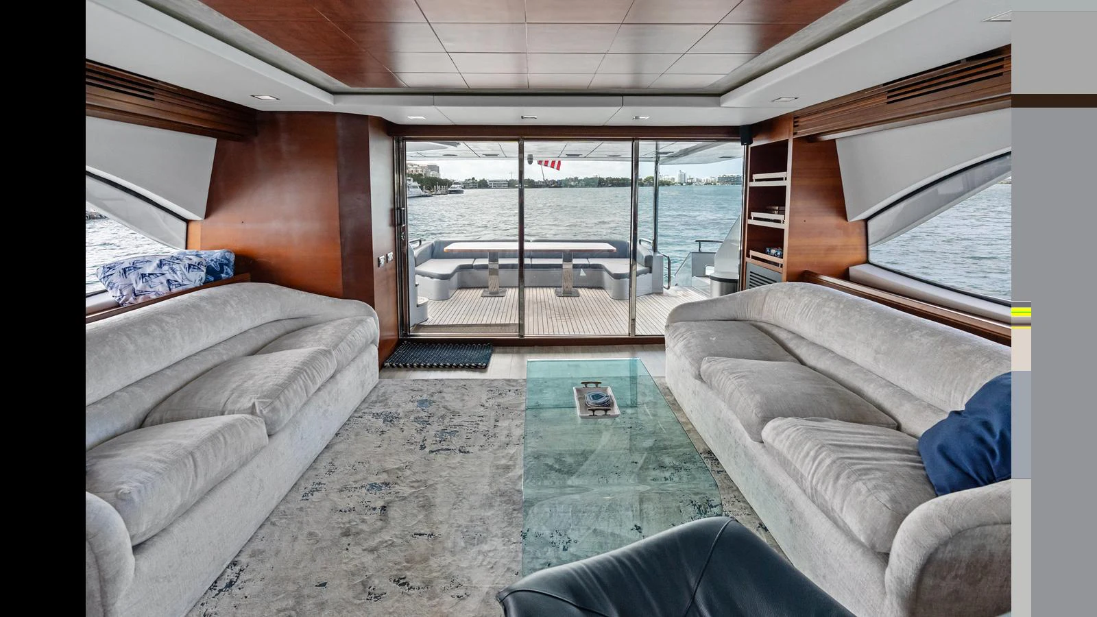 a room with a couch and a table aboard KNOT WOKE Yacht for Sale
