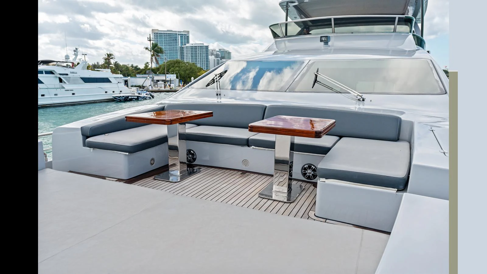 a white yacht on a deck aboard KNOT WOKE Yacht for Sale