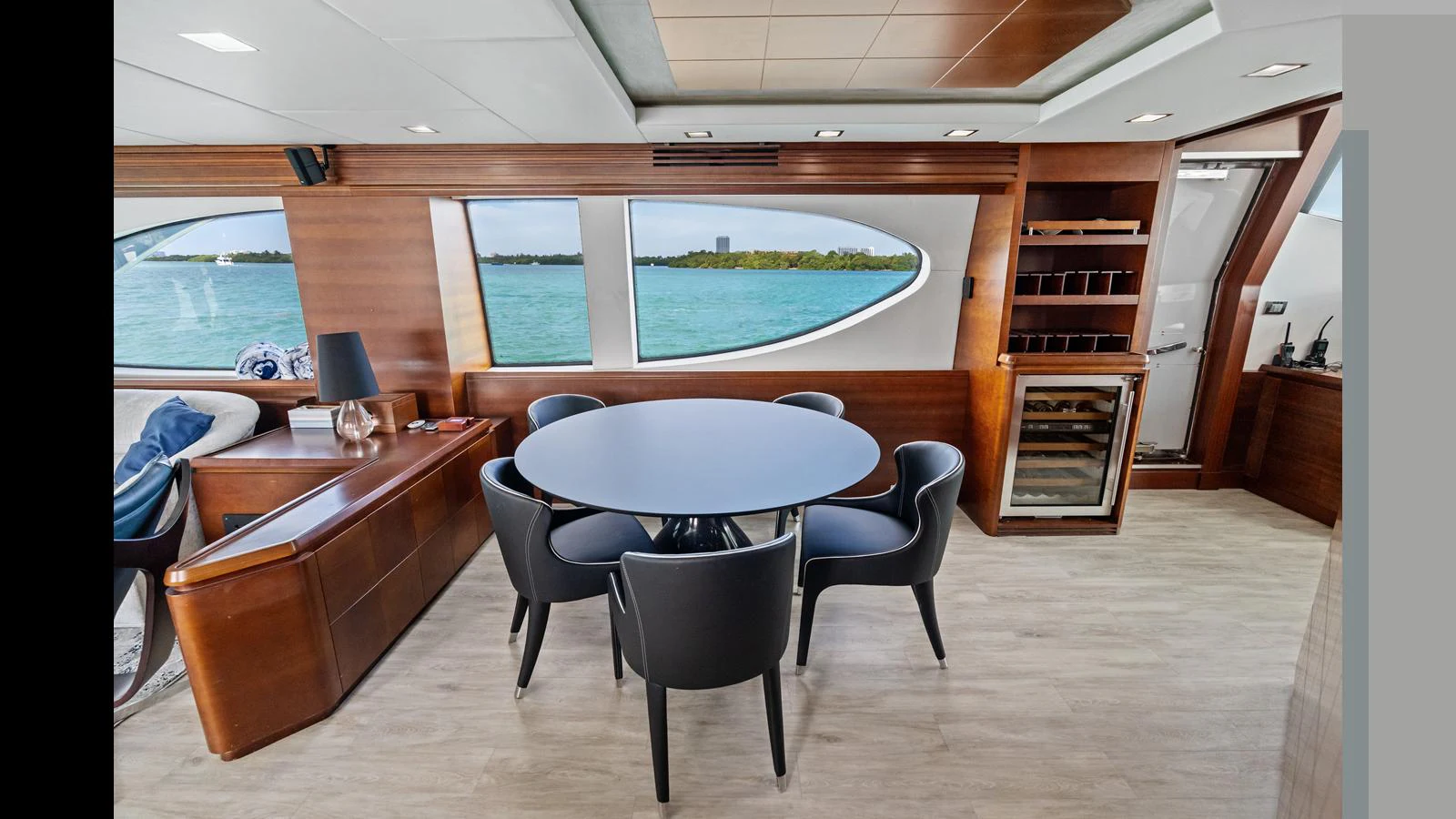 a room with a table and chairs aboard KNOT WOKE Yacht for Sale