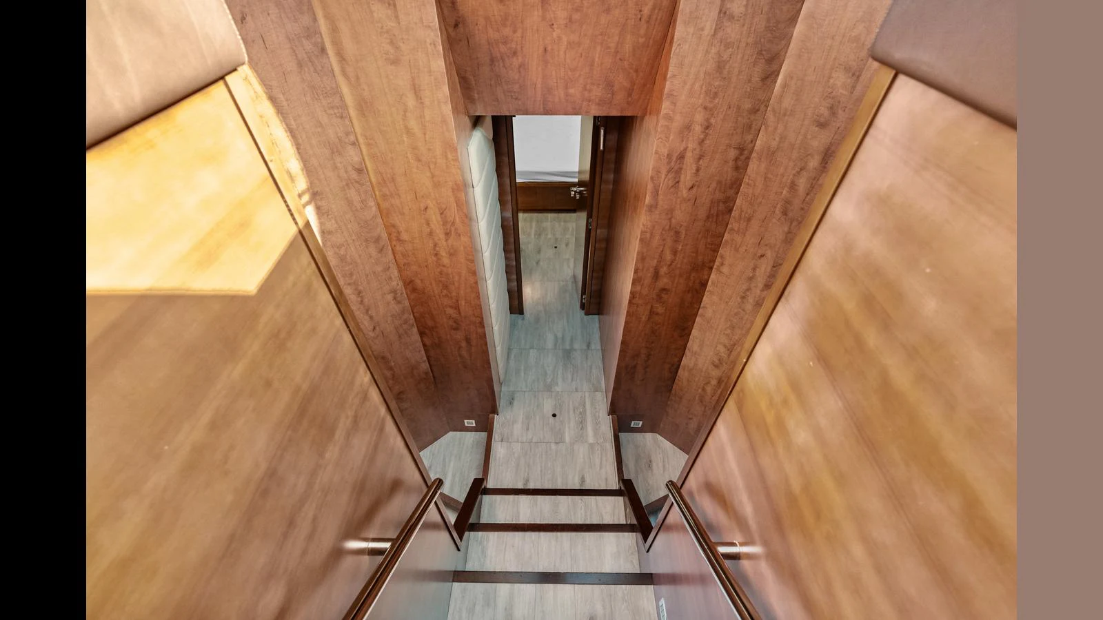 a hallway with wood floors aboard KNOT WOKE Yacht for Sale