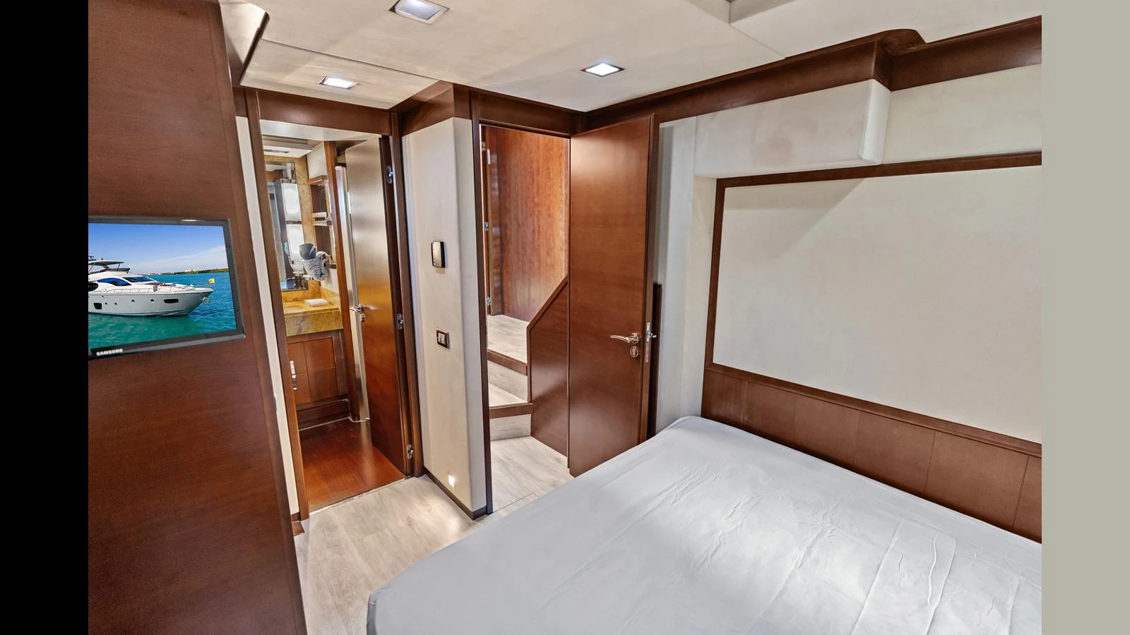 a room with a bed and a pool aboard KNOT WOKE Yacht for Sale