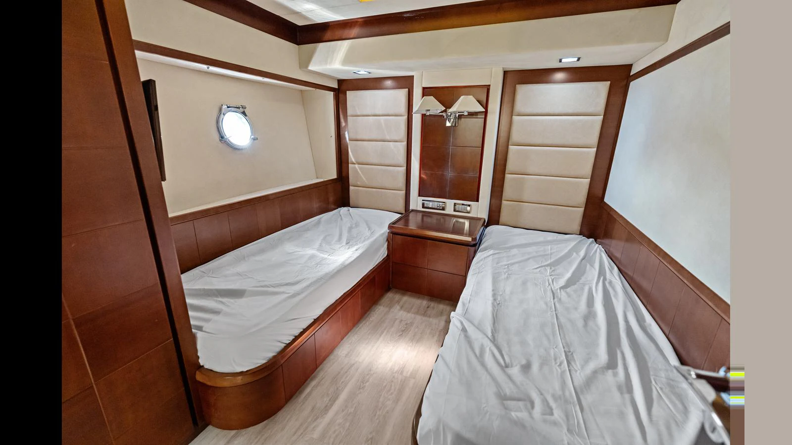 a room with two beds aboard KNOT WOKE Yacht for Sale