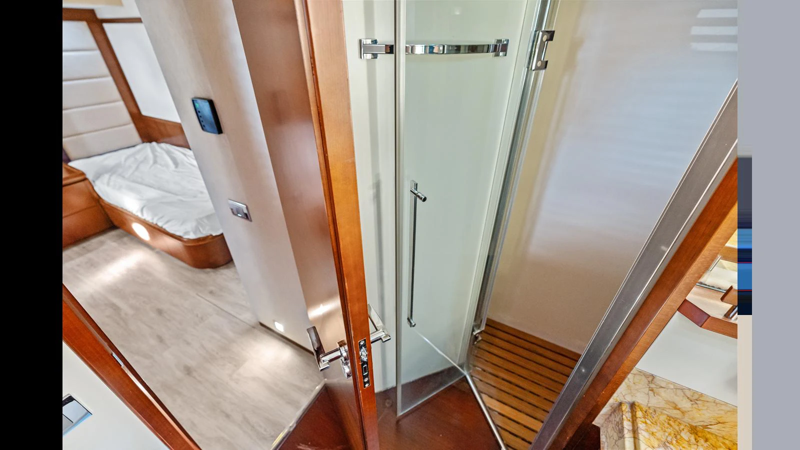 a room with a bed and a closet aboard KNOT WOKE Yacht for Sale