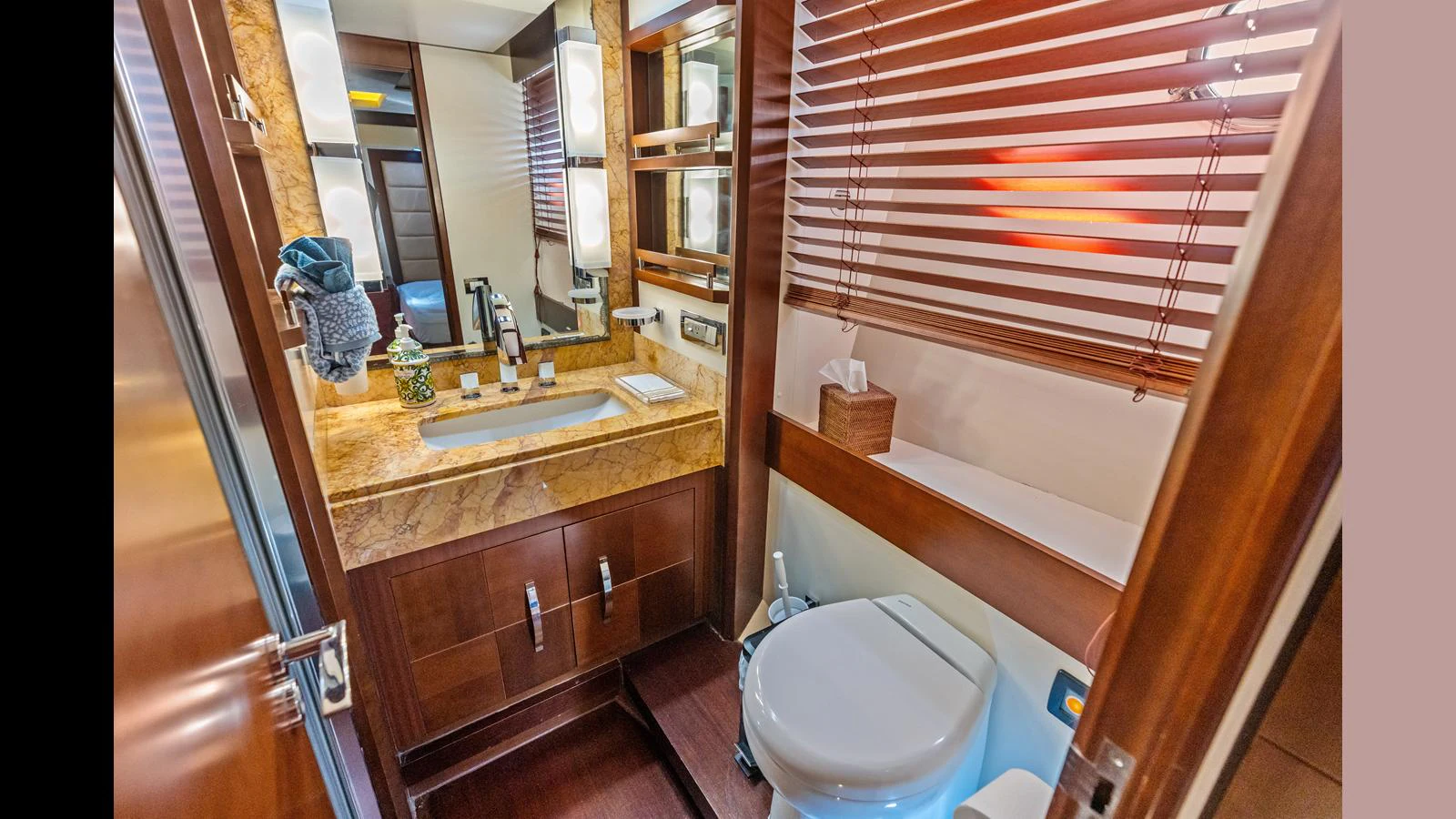 a bathroom with a sink and a toilet aboard KNOT WOKE Yacht for Sale