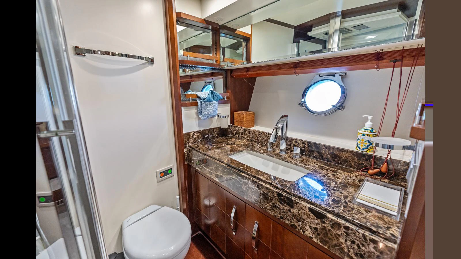 a bathroom with a sink and a toilet aboard KNOT WOKE Yacht for Sale