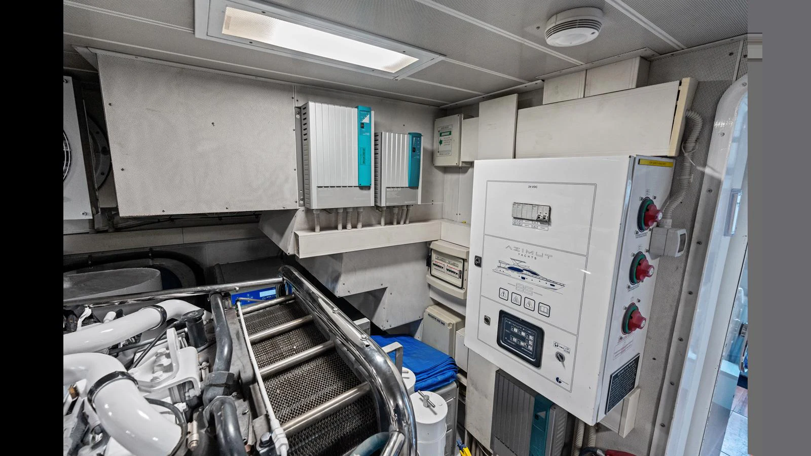 a room with a white refrigerator and a white door aboard KNOT WOKE Yacht for Sale