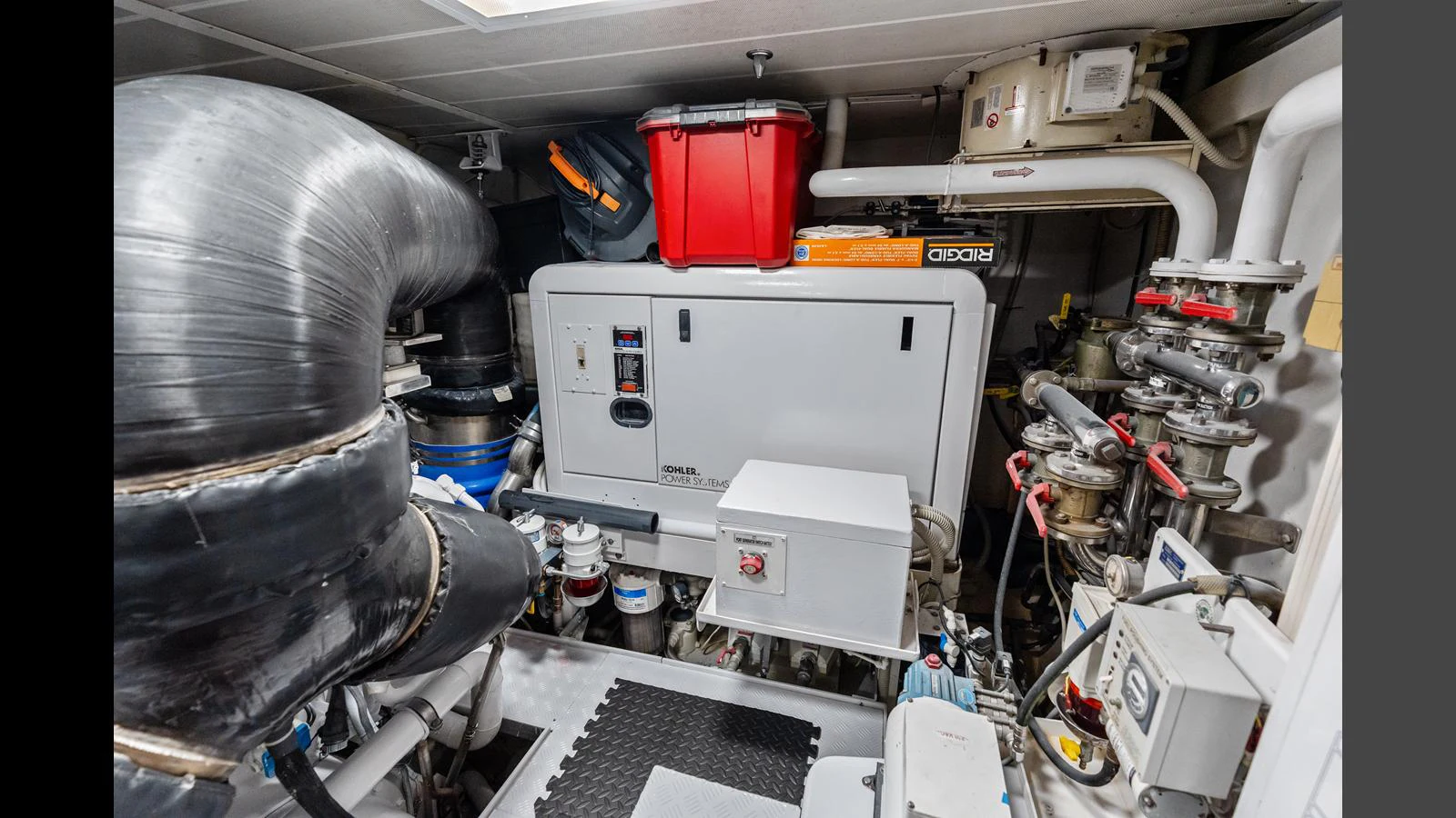a large machine in a room aboard KNOT WOKE Yacht for Sale