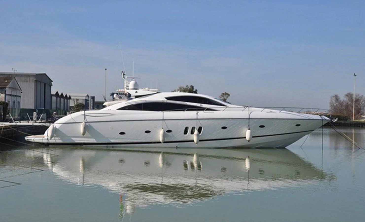 a white yacht in a body of water aboard ESY Yacht for Sale