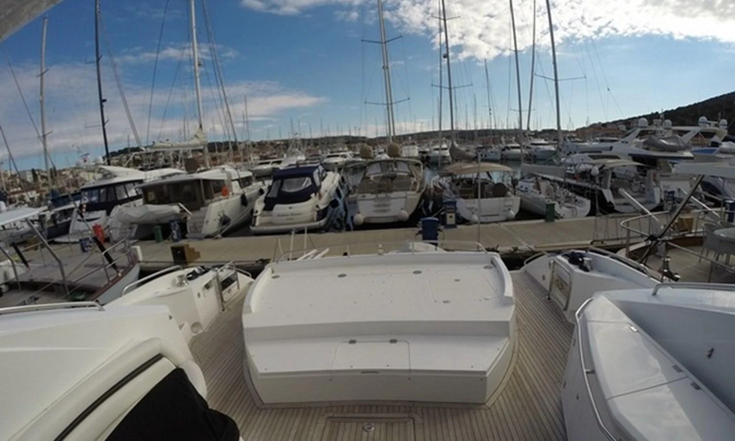 a group of boats are parked in a harbor aboard ESY Yacht for Sale
