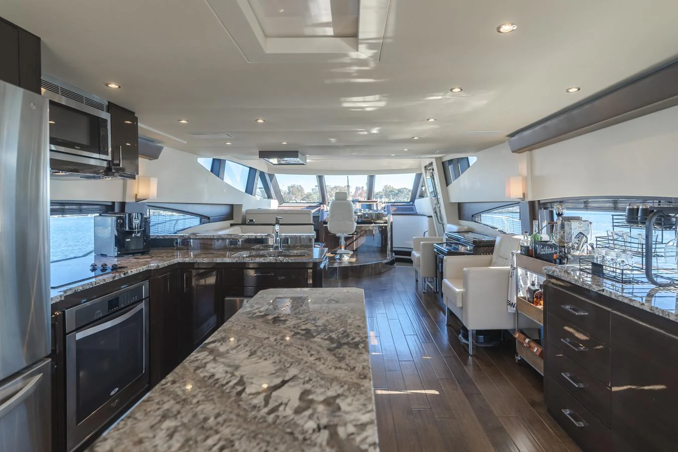 a large kitchen with a large island aboard FINE SEAS-ONINGS Yacht for Sale