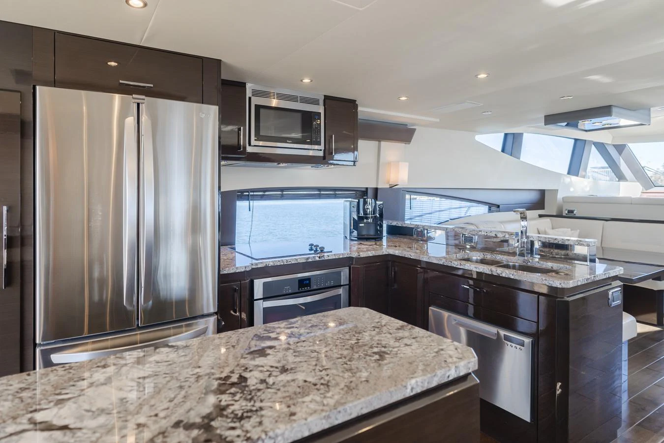 a kitchen with a marble counter top aboard FINE SEAS-ONINGS Yacht for Sale