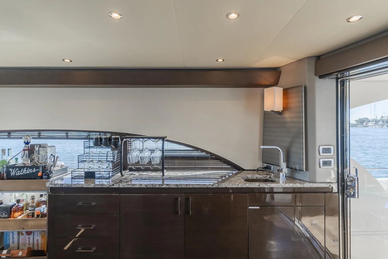 a kitchen with a large glass window aboard FINE SEAS-ONINGS Yacht for Sale