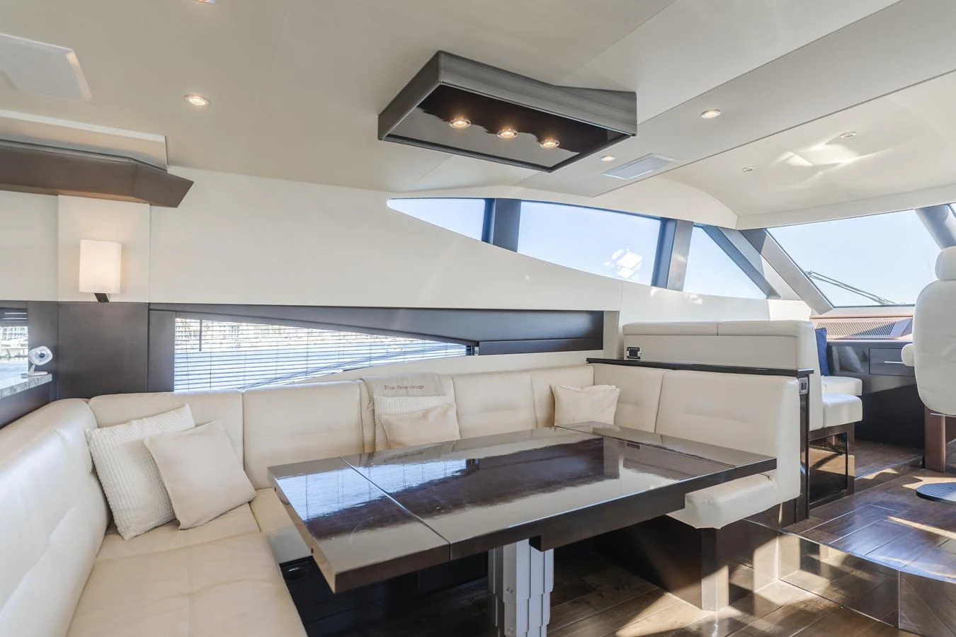 a room with a couch and a table aboard FINE SEAS-ONINGS Yacht for Sale