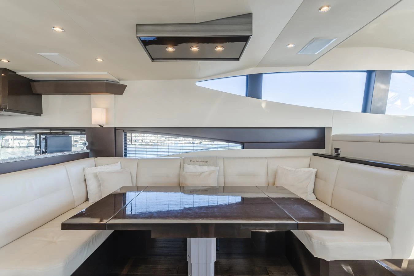 a room with a table and chairs aboard FINE SEAS-ONINGS Yacht for Sale