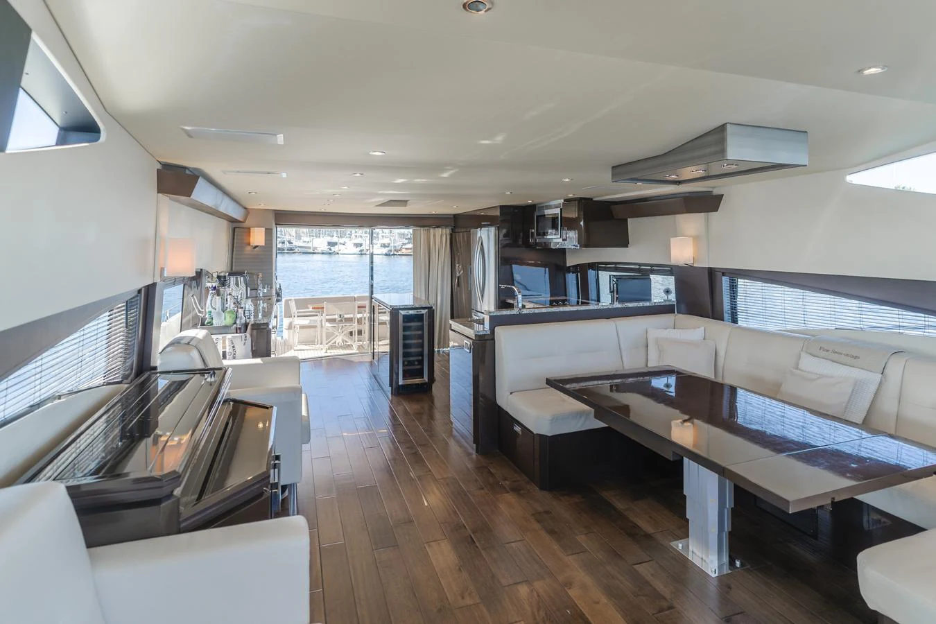 a room with a couch and a table aboard FINE SEAS-ONINGS Yacht for Sale