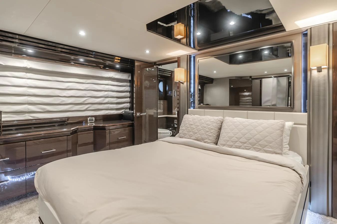 a bedroom with a large bed aboard FINE SEAS-ONINGS Yacht for Sale