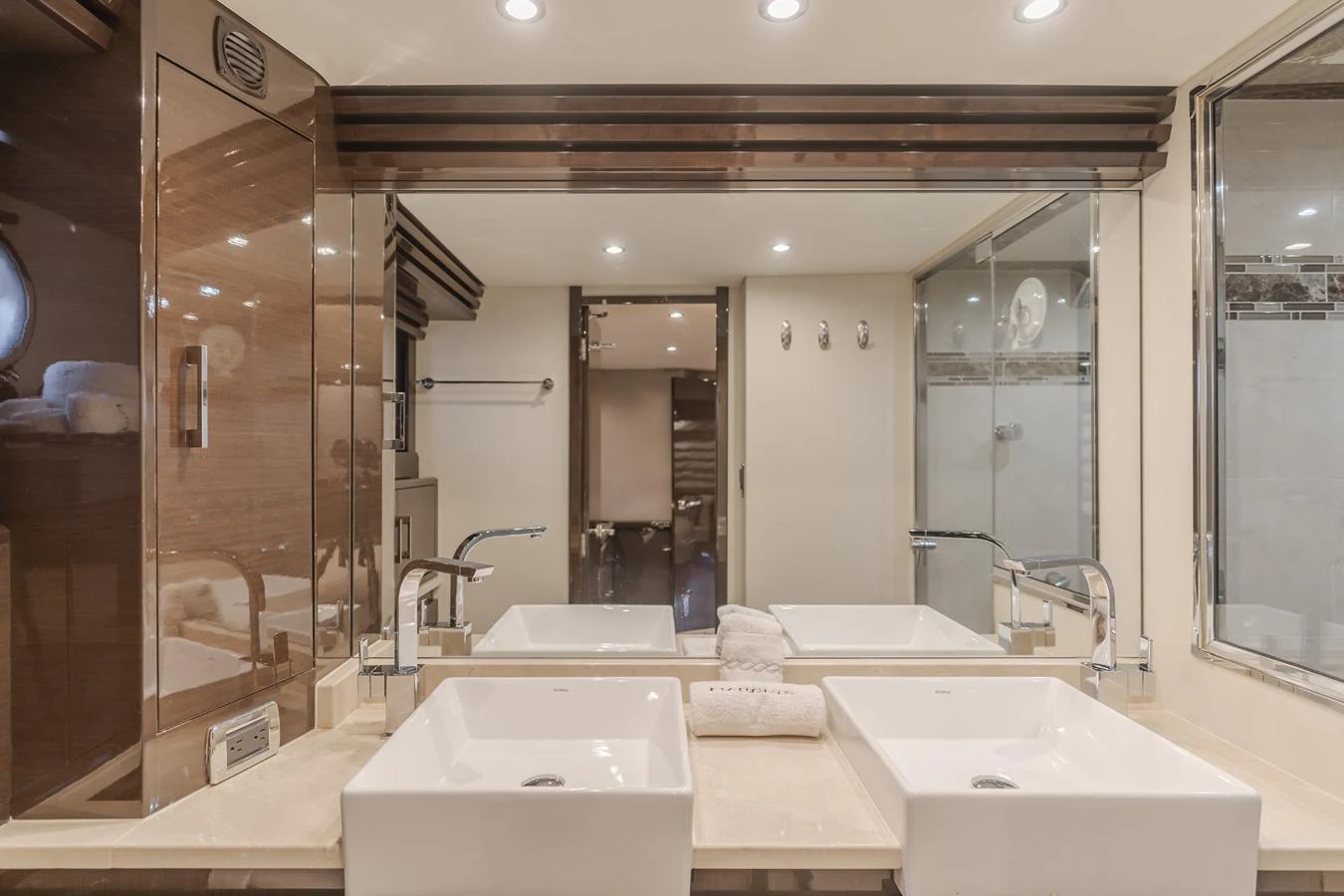a bathroom with a large mirror aboard FINE SEAS-ONINGS Yacht for Sale