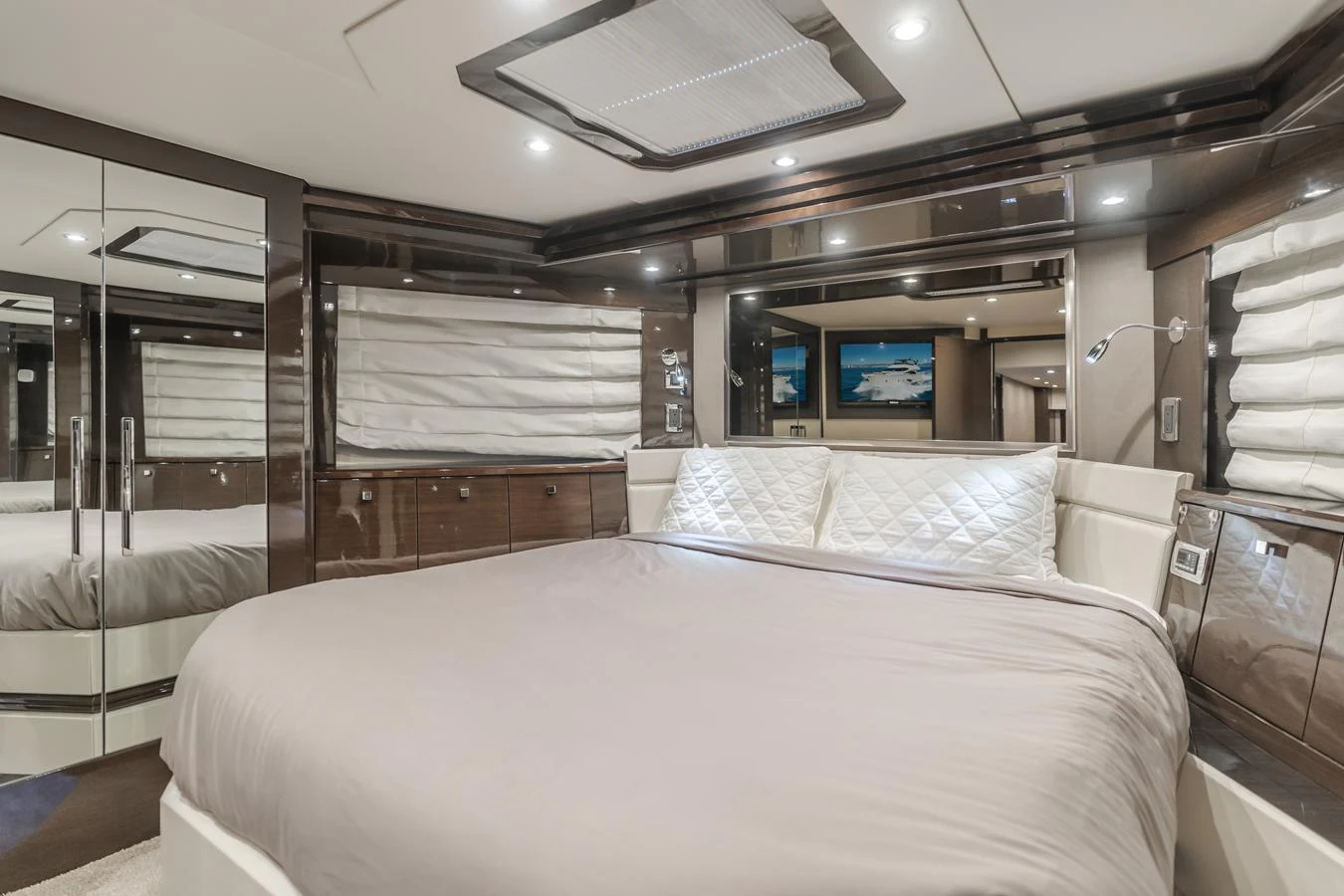 a room with a bed and a television aboard FINE SEAS-ONINGS Yacht for Sale