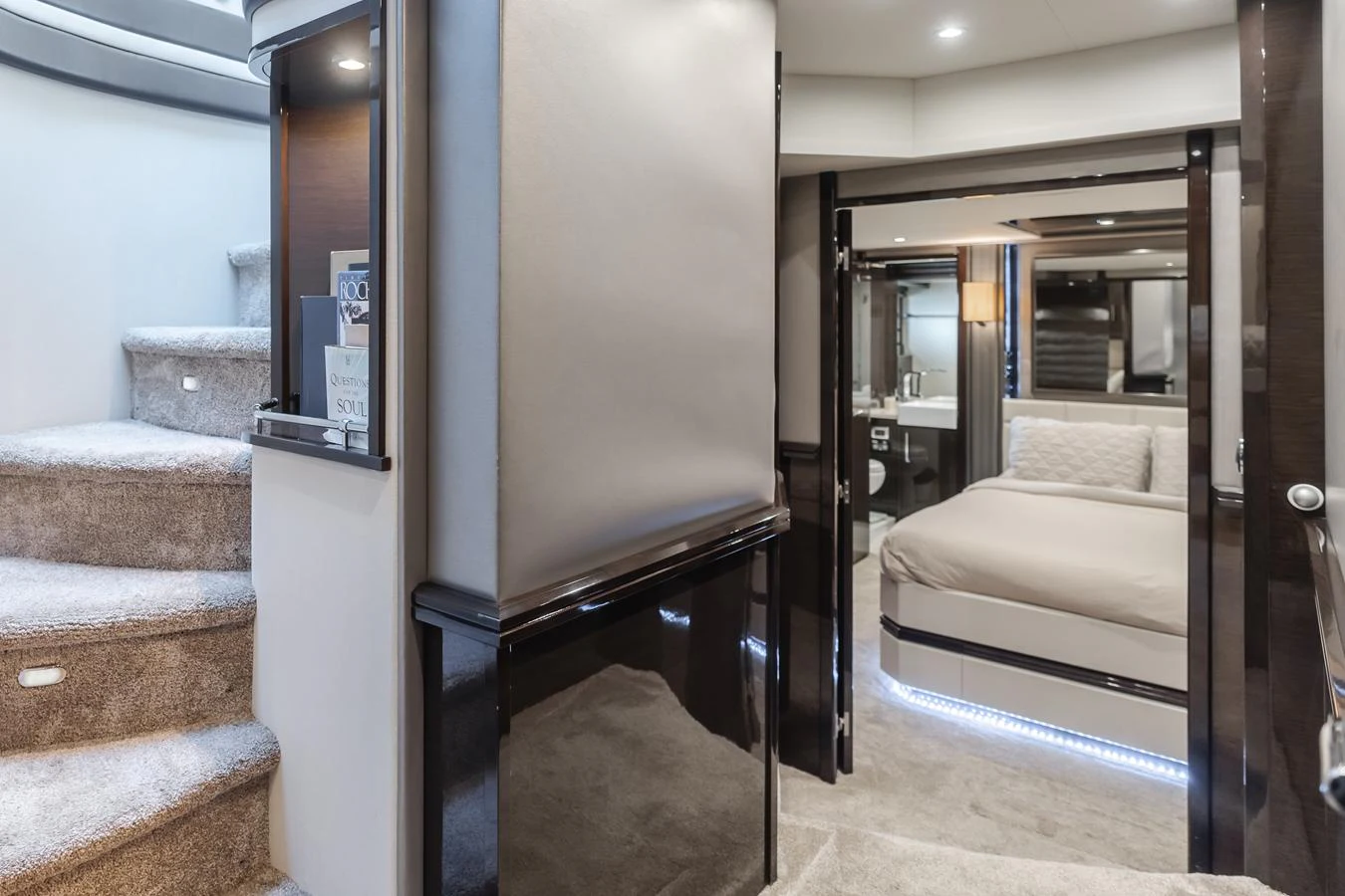 a room with a bed and a couch aboard FINE SEAS-ONINGS Yacht for Sale