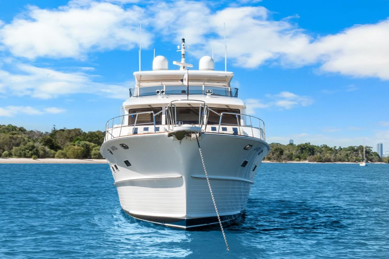 a white boat in the water aboard ENCORE Yacht for Sale
