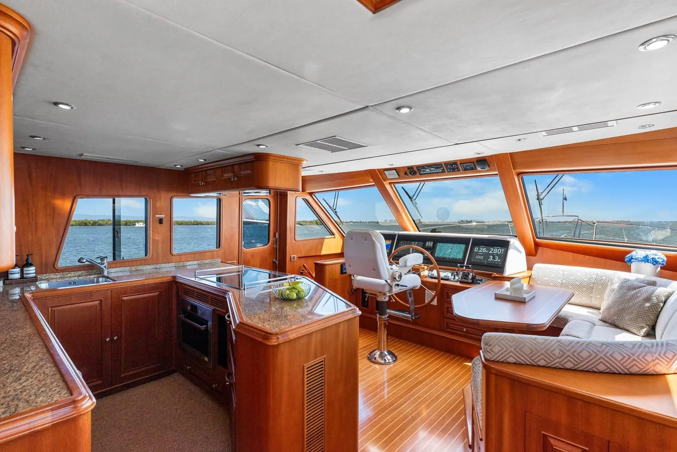 a kitchen and living room aboard ENCORE Yacht for Sale
