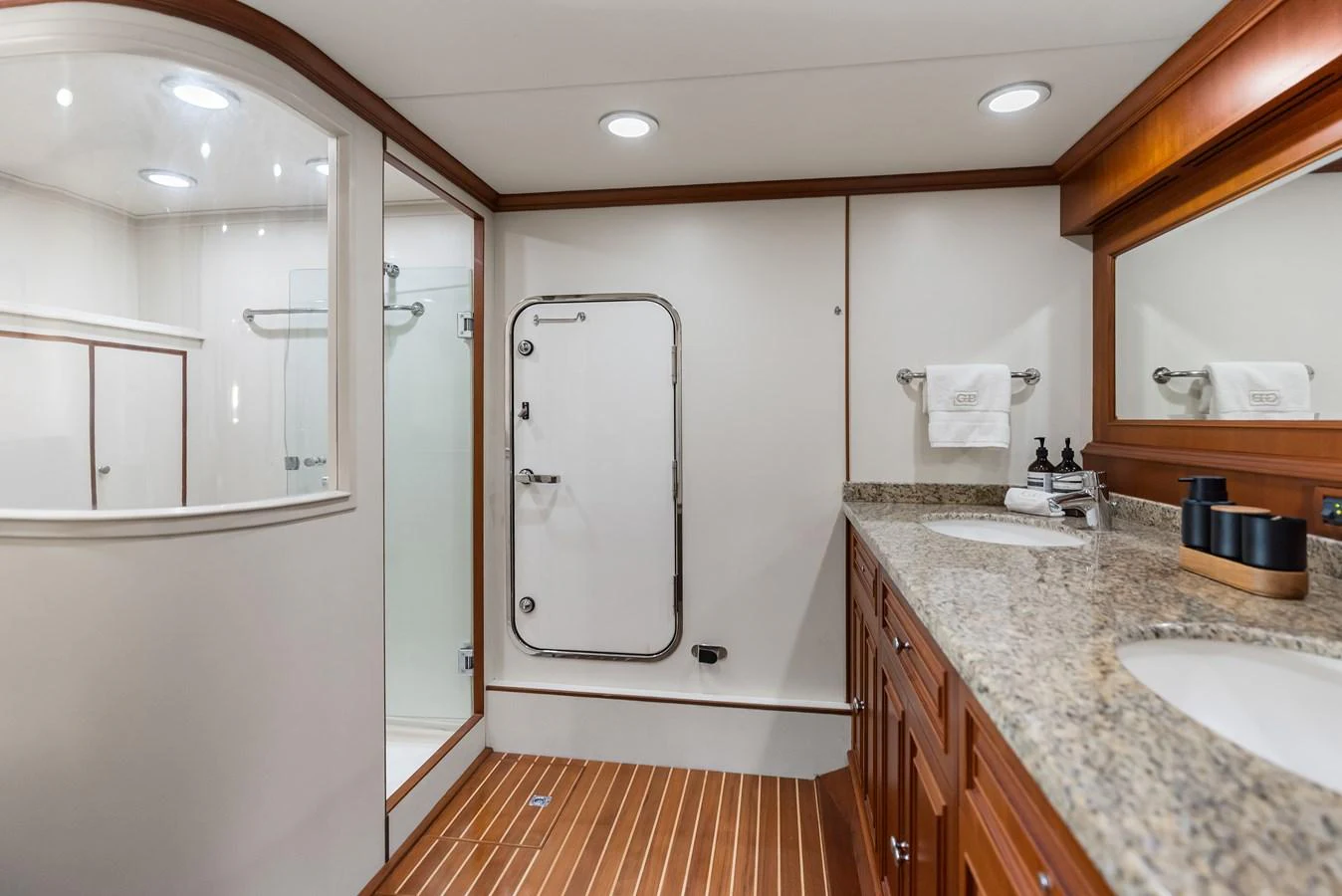 a bathroom with a shower unit and sink aboard ENCORE Yacht for Sale