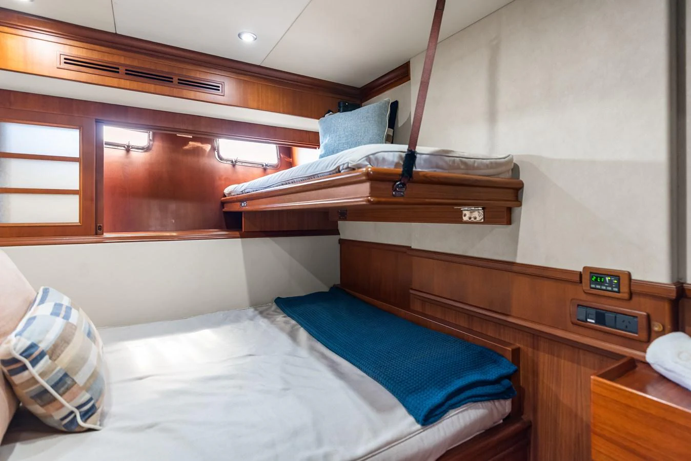 a room with bunk beds aboard ENCORE Yacht for Sale